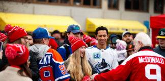 An excited fan meets NHL alumnus Lanny McDonald at Scotiabank Hockey Day in Canada - Victoria 2024. Photo: Jay Wallace.